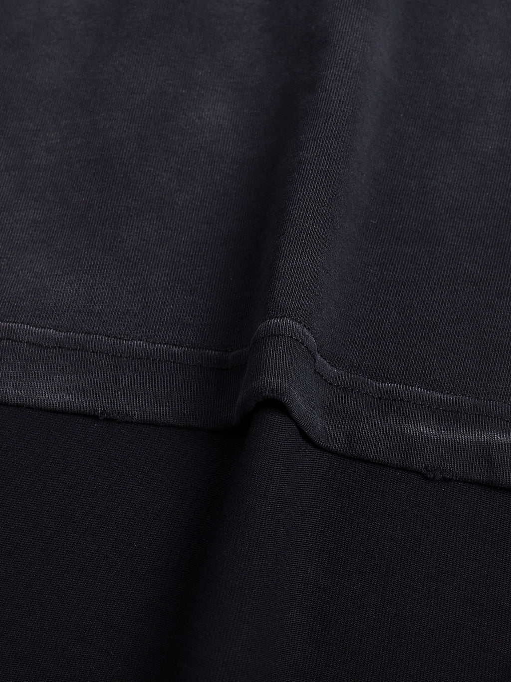 Close view of 260 GSM cotton texture and reinforced stitching