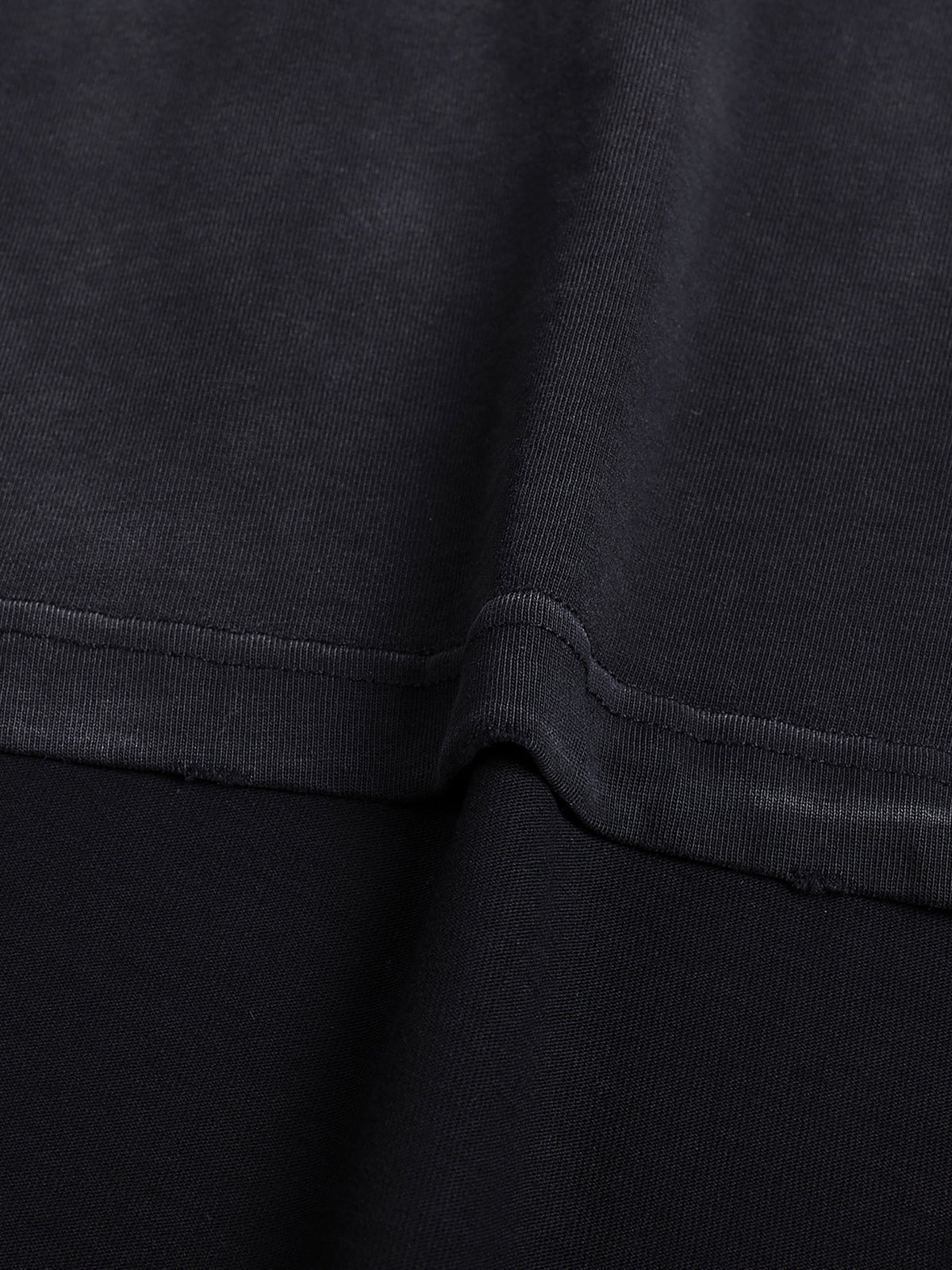 Close view of 260 GSM cotton texture and reinforced stitching