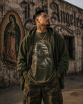 Model wearing a Hunter Green RipGorilla luxury graphic tee with a distressed gorilla glitch design